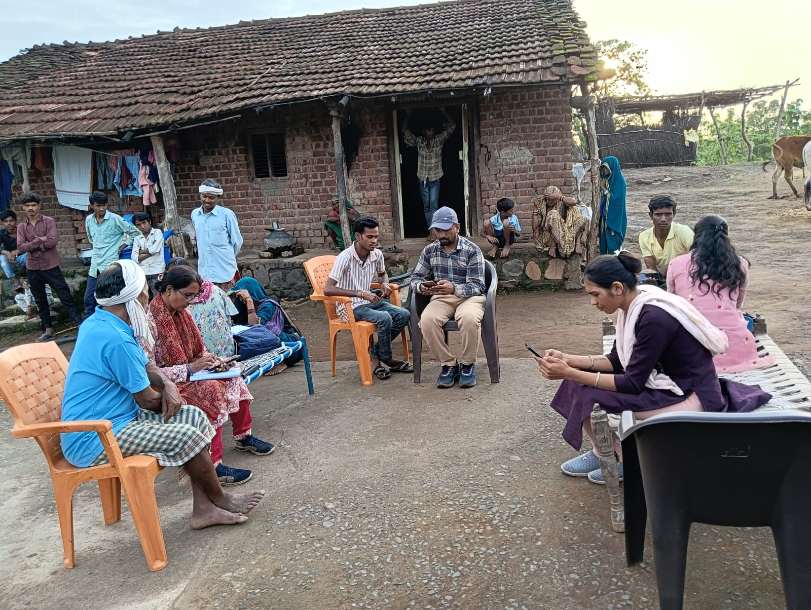 Community meeting held under a temporary shade