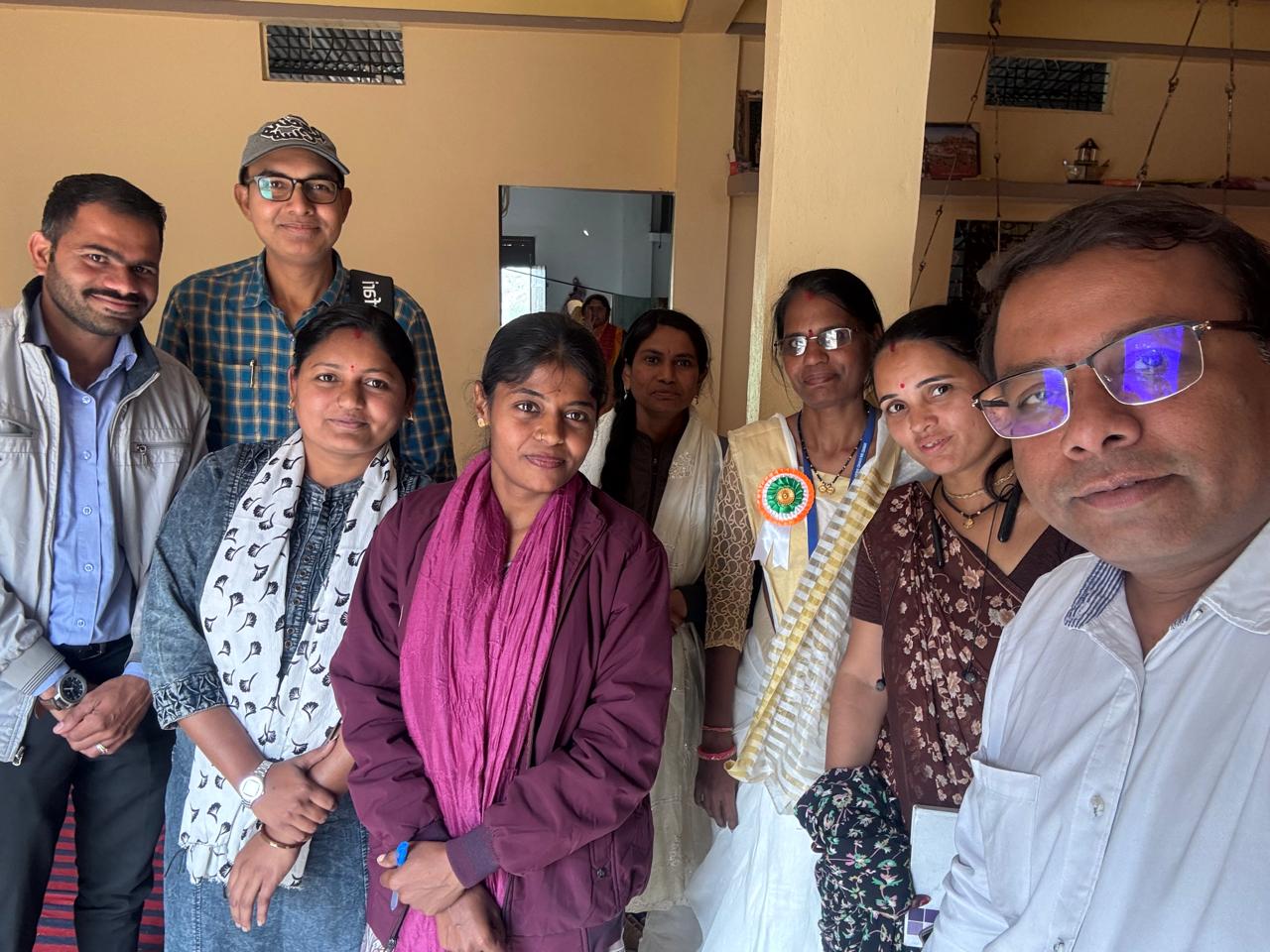Listening to village leaders during a group meeting