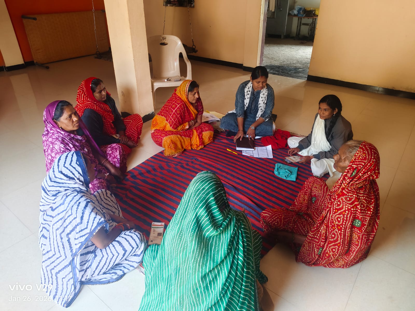 Outdoor consultation with farmers and youth