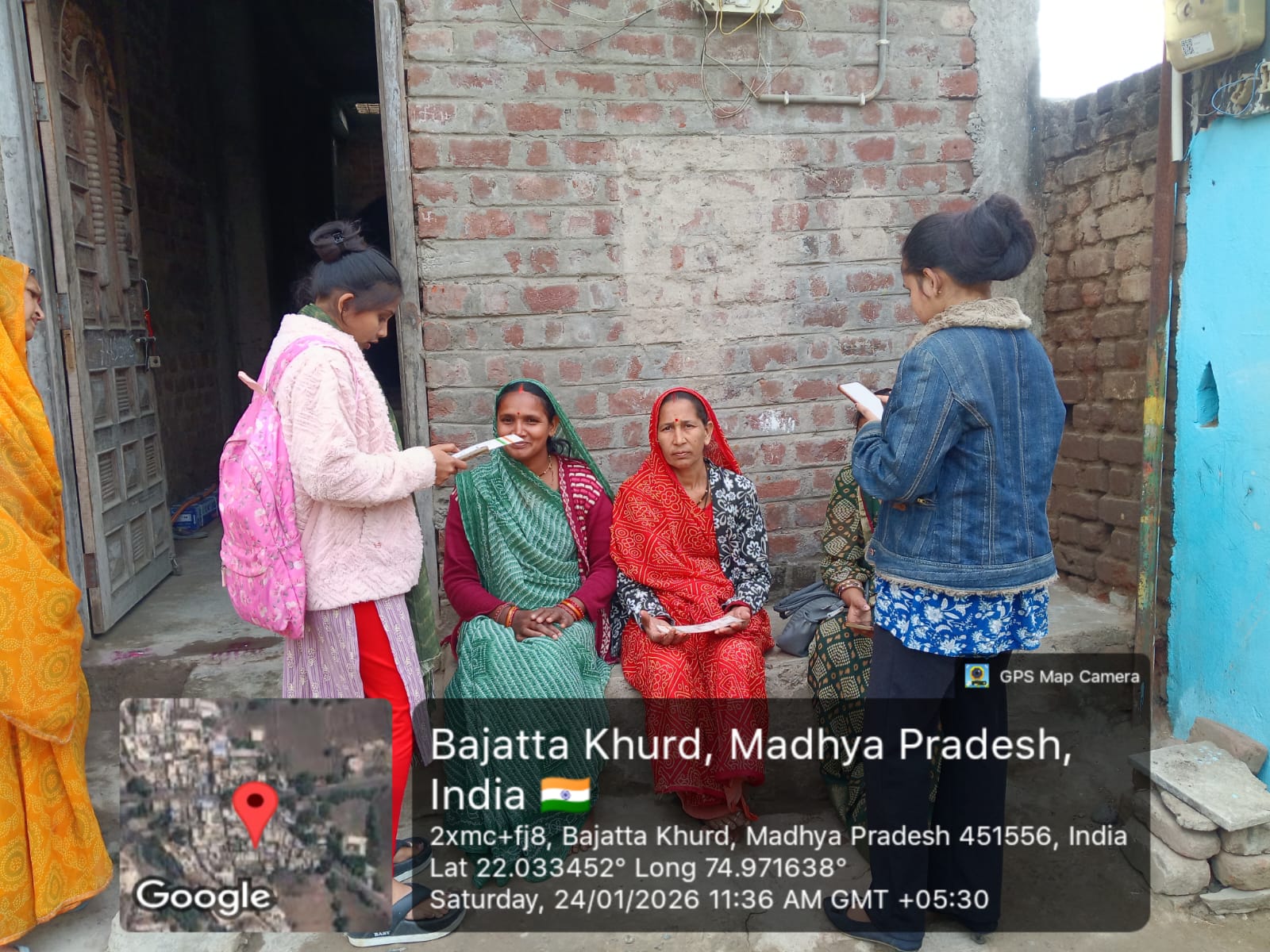 Stakeholder meeting in a village community hall